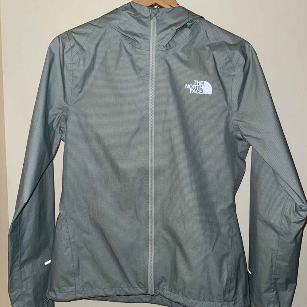 The North Face Gray Ski Jacket with Hood and Water-Resistant Material